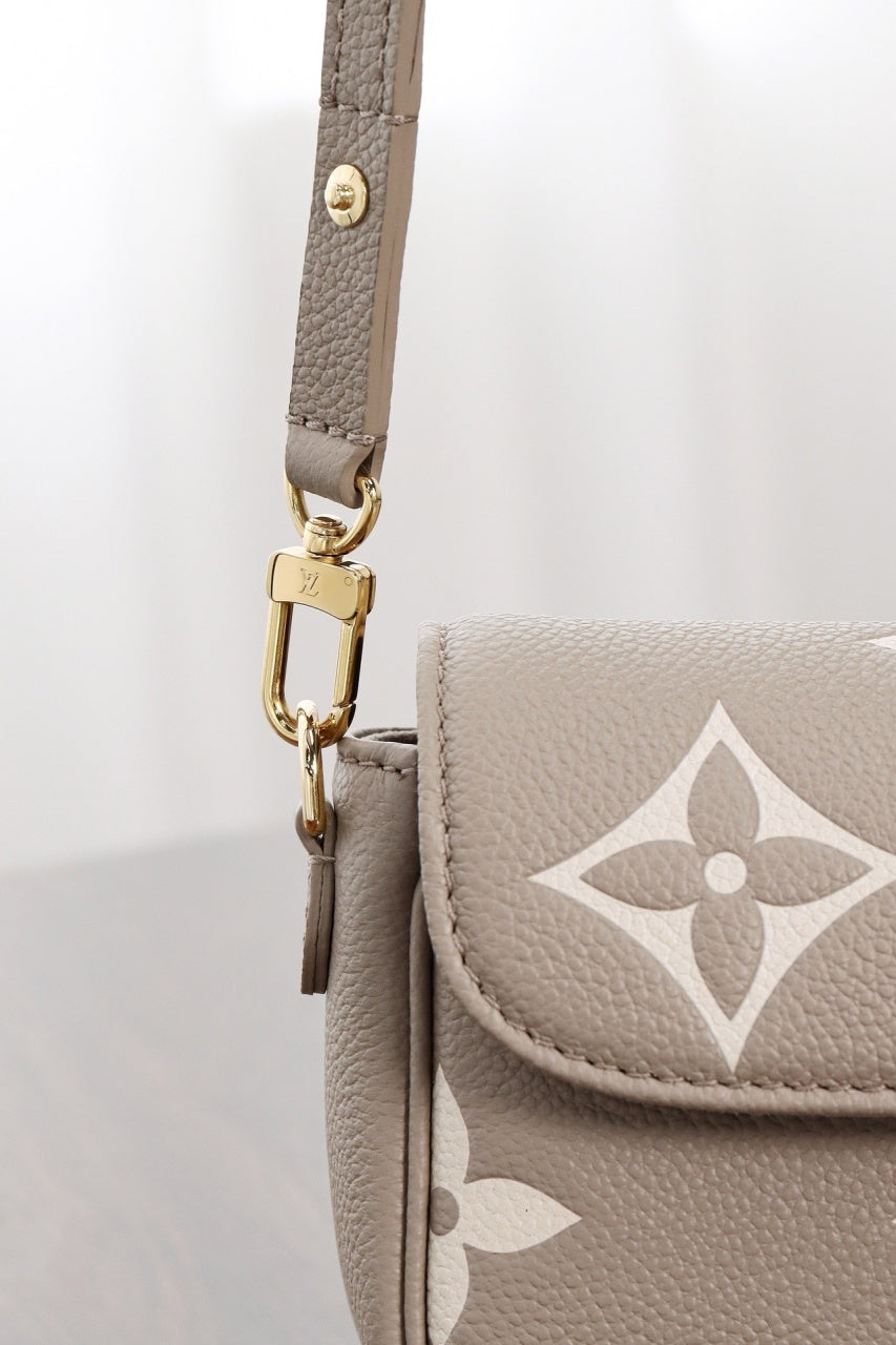 루이비통 아이비 WOC 앙프렝뜨