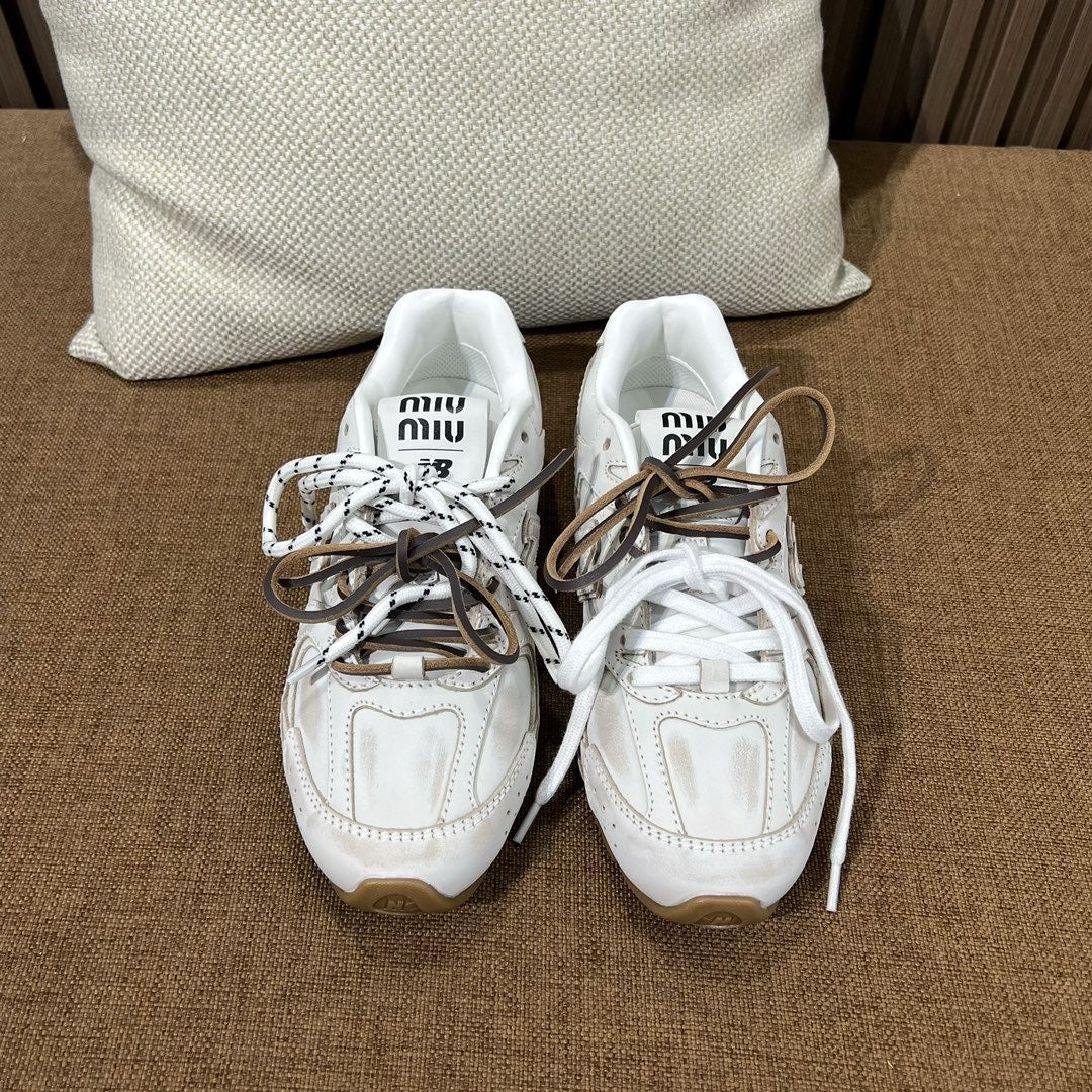 미우미우 X 뉴발란스 530 SL 가죽 스니커즈