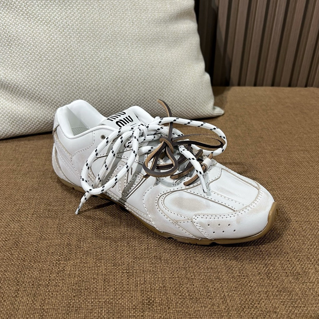 미우미우 X 뉴발란스 530 SL 가죽 스니커즈