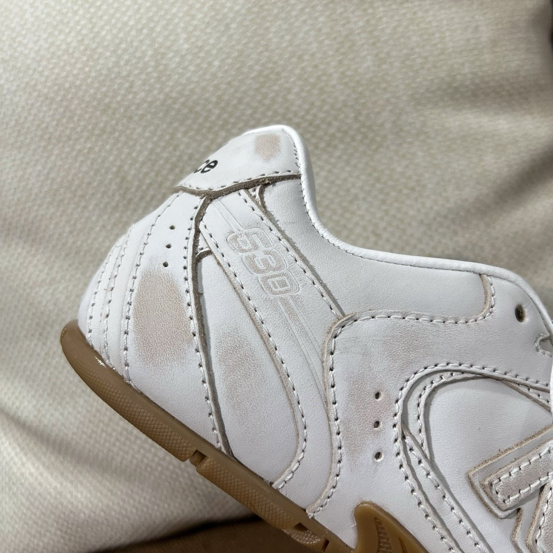 미우미우 X 뉴발란스 530 SL 가죽 스니커즈