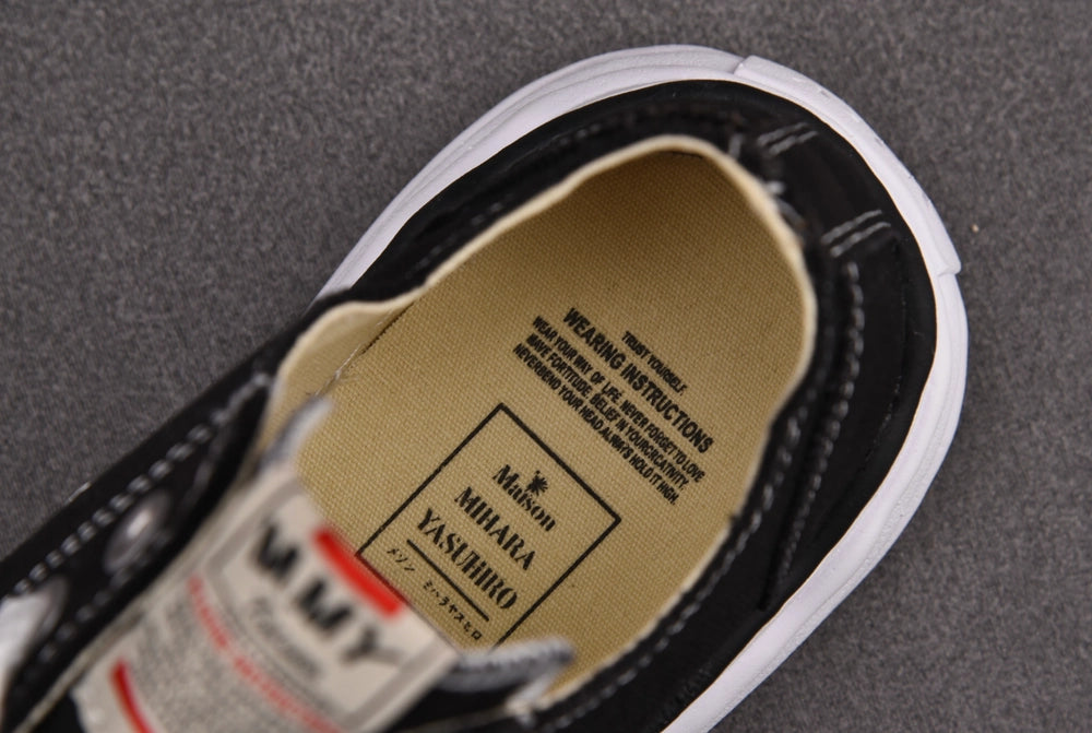 메종 미하라 야스히로 피터슨 OG 솔 캔버스 로우 스니커즈 블랙