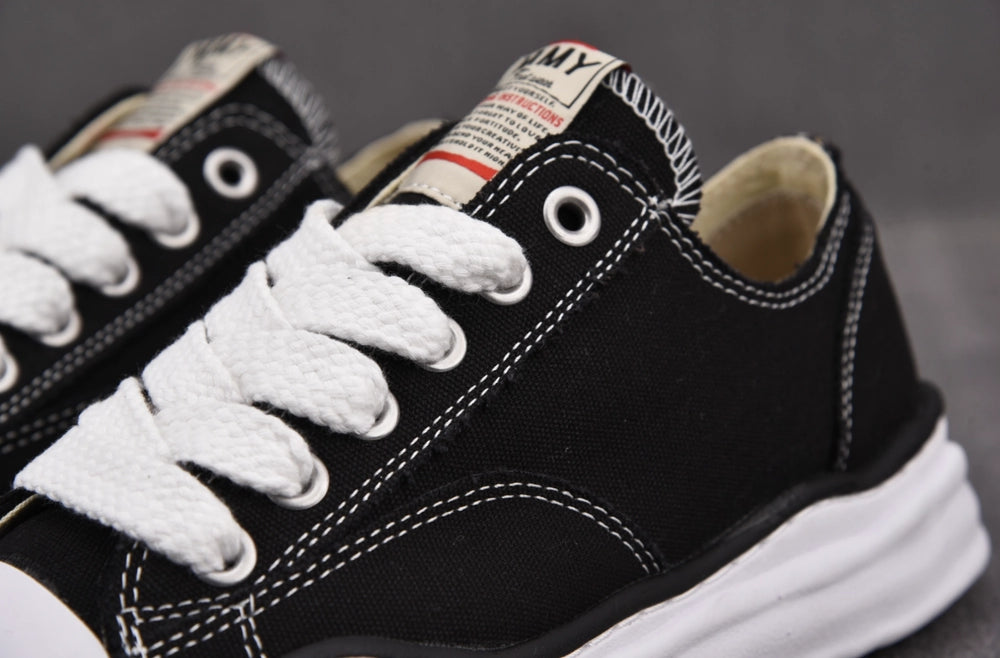 메종 미하라 야스히로 피터슨 OG 솔 캔버스 로우 스니커즈 블랙