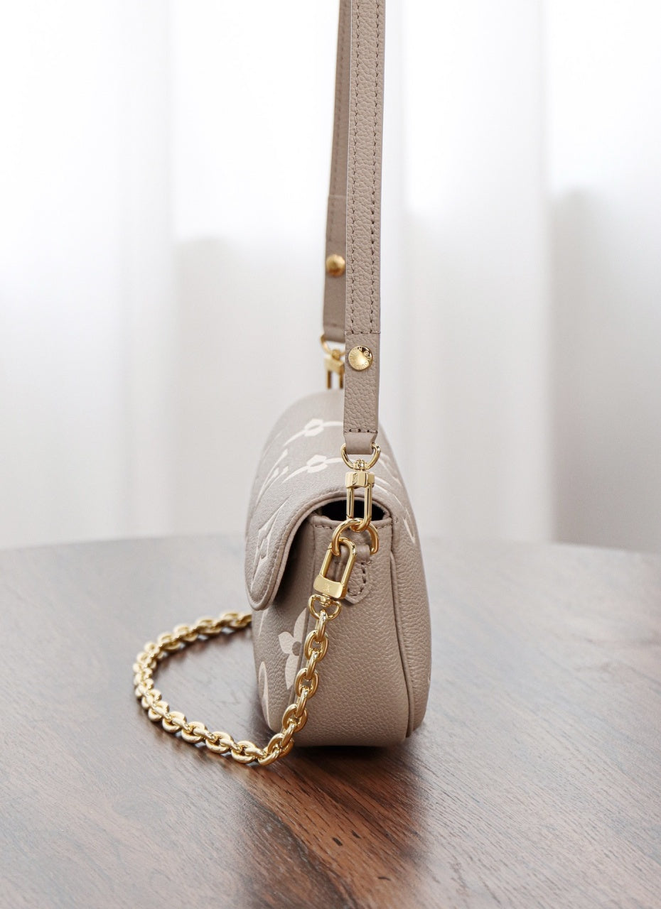 루이비통 아이비 WOC 앙프렝뜨