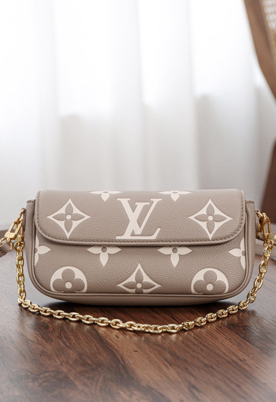 루이비통 아이비 WOC 앙프렝뜨