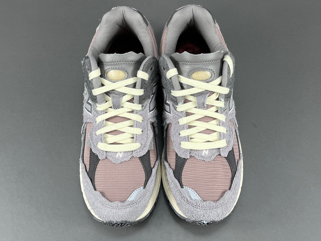 뉴발란스 2002R 프로텍션 팩 징크 에펠탑