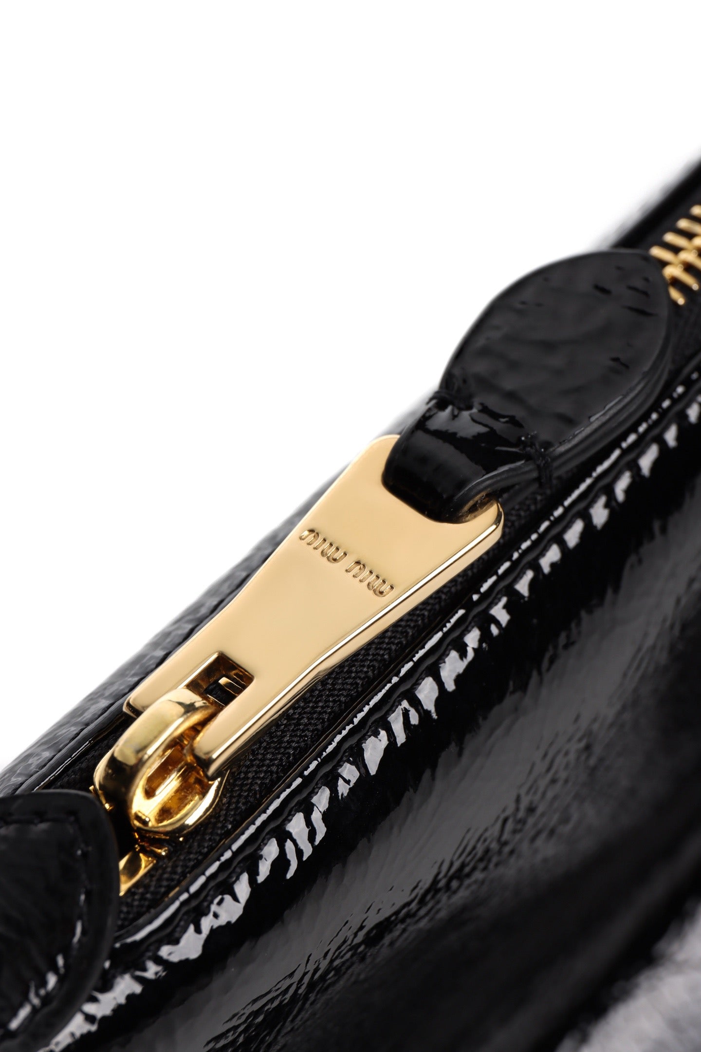 미우미우 나플락 파우치 페이던트 미니백