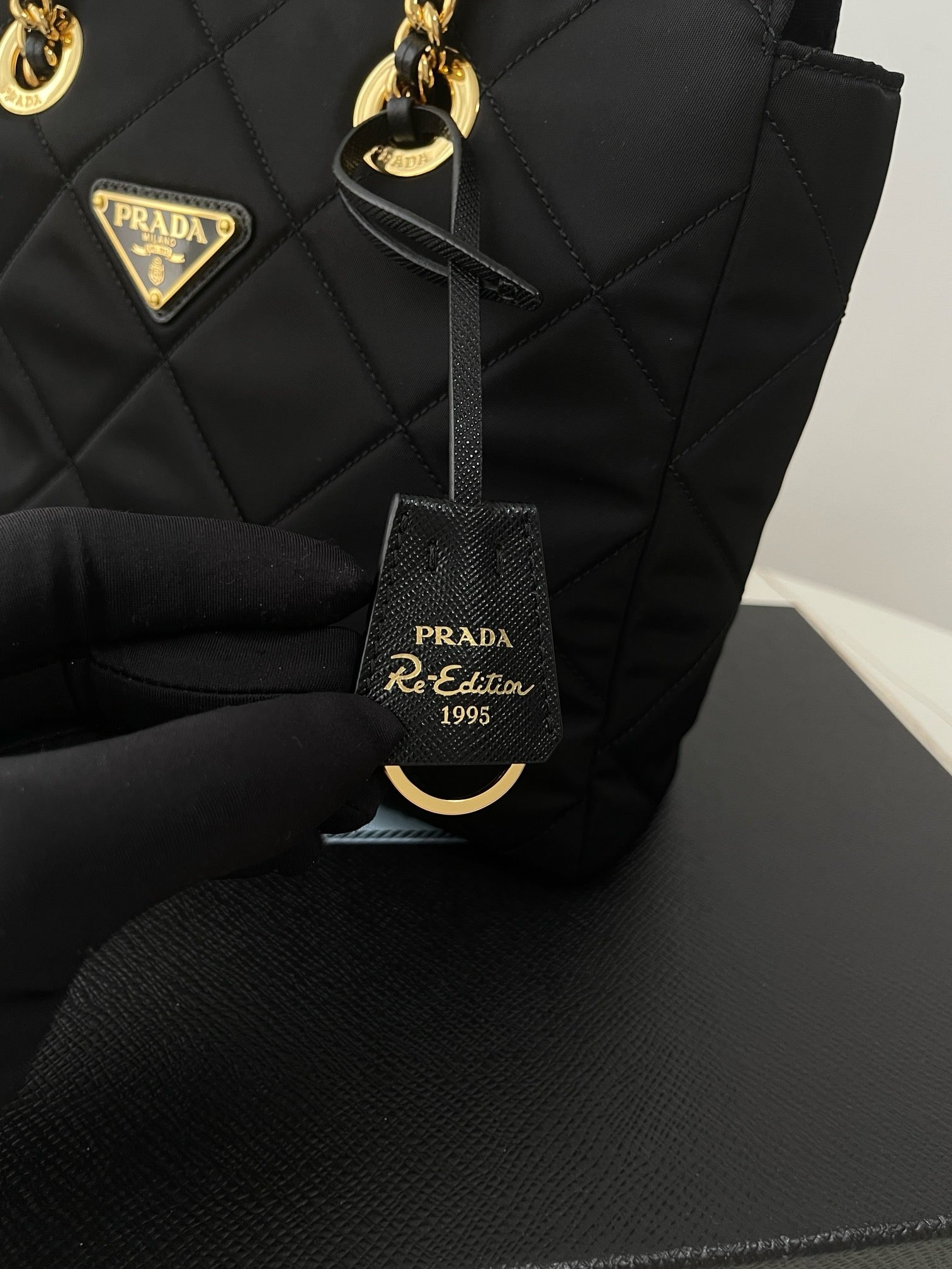 프라다 리에디션 리나일론 퀄팅 체인 숄더백