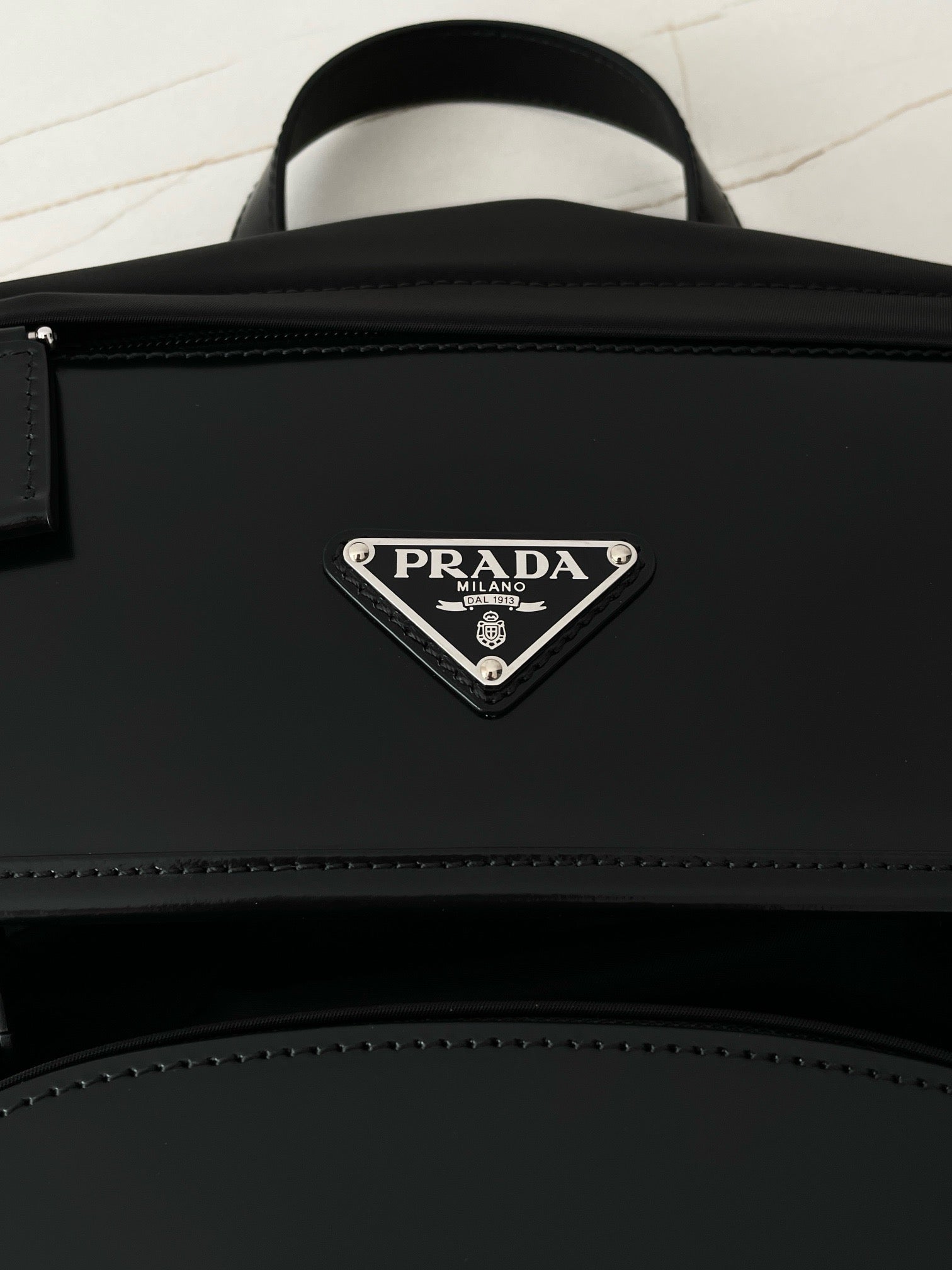 프라다 리나일론 레더 플랩 백팩