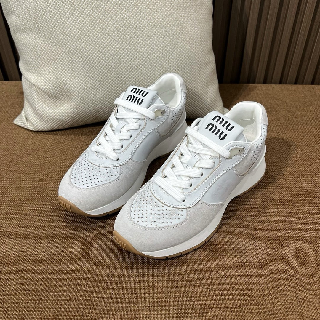 미우미우 퍼퍼레이터드 로우 탑 스니커즈