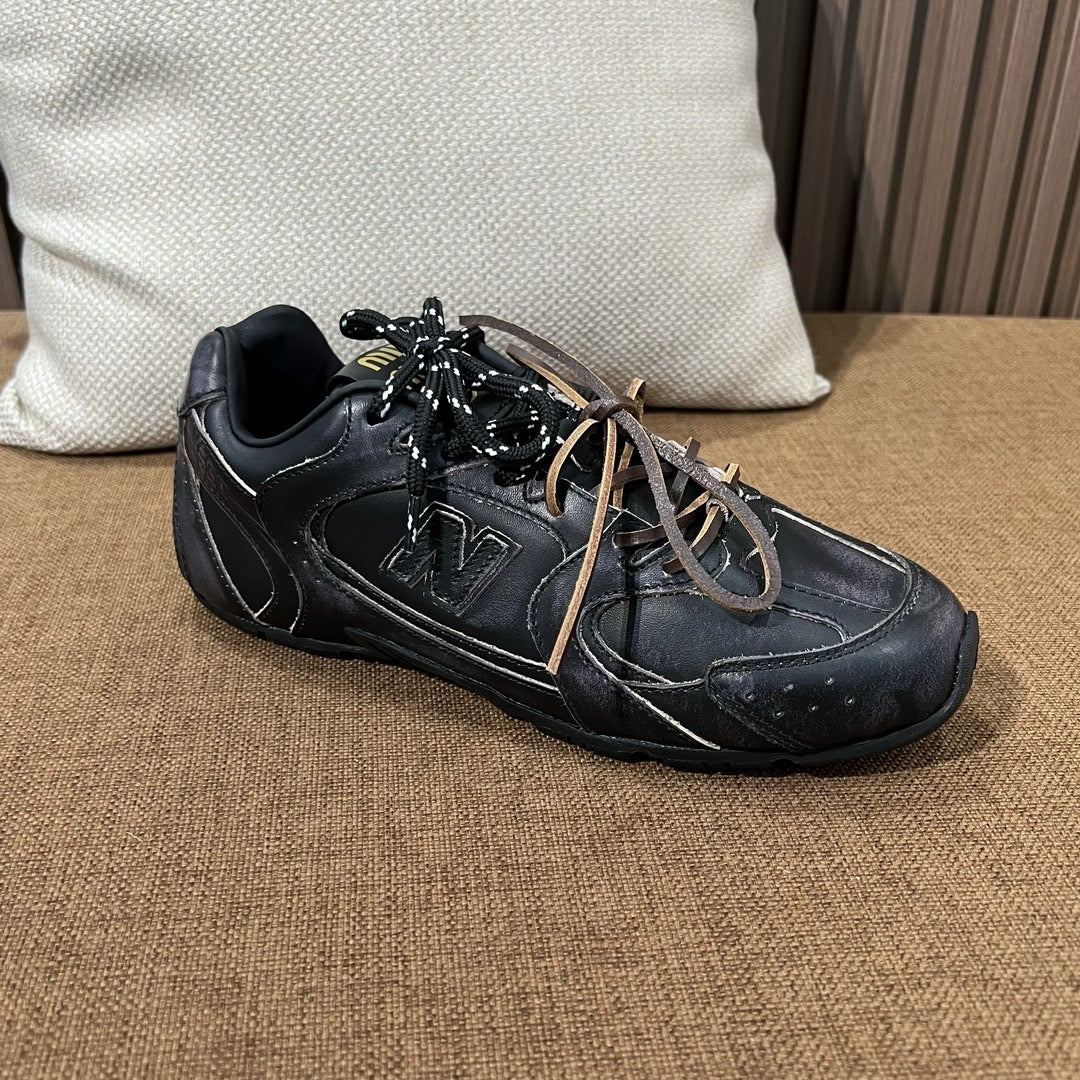 미우미우 X 뉴발란스 530 SL 가죽 스니커즈