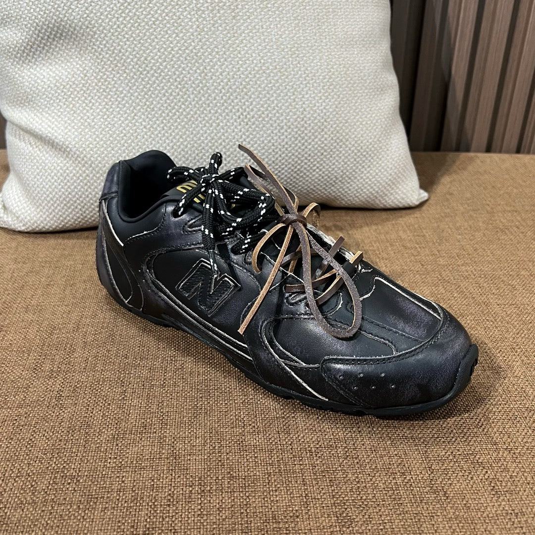 미우미우 X 뉴발란스 530 SL 가죽 스니커즈