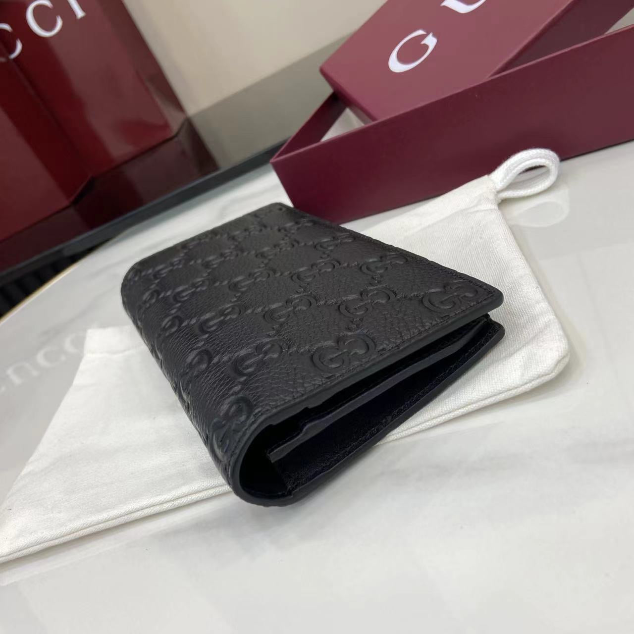 구찌 블랙 GG 레더 임프린트 장지갑