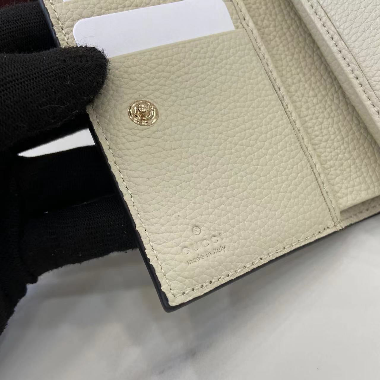 구찌 GG 엠블럼 스몰 지갑