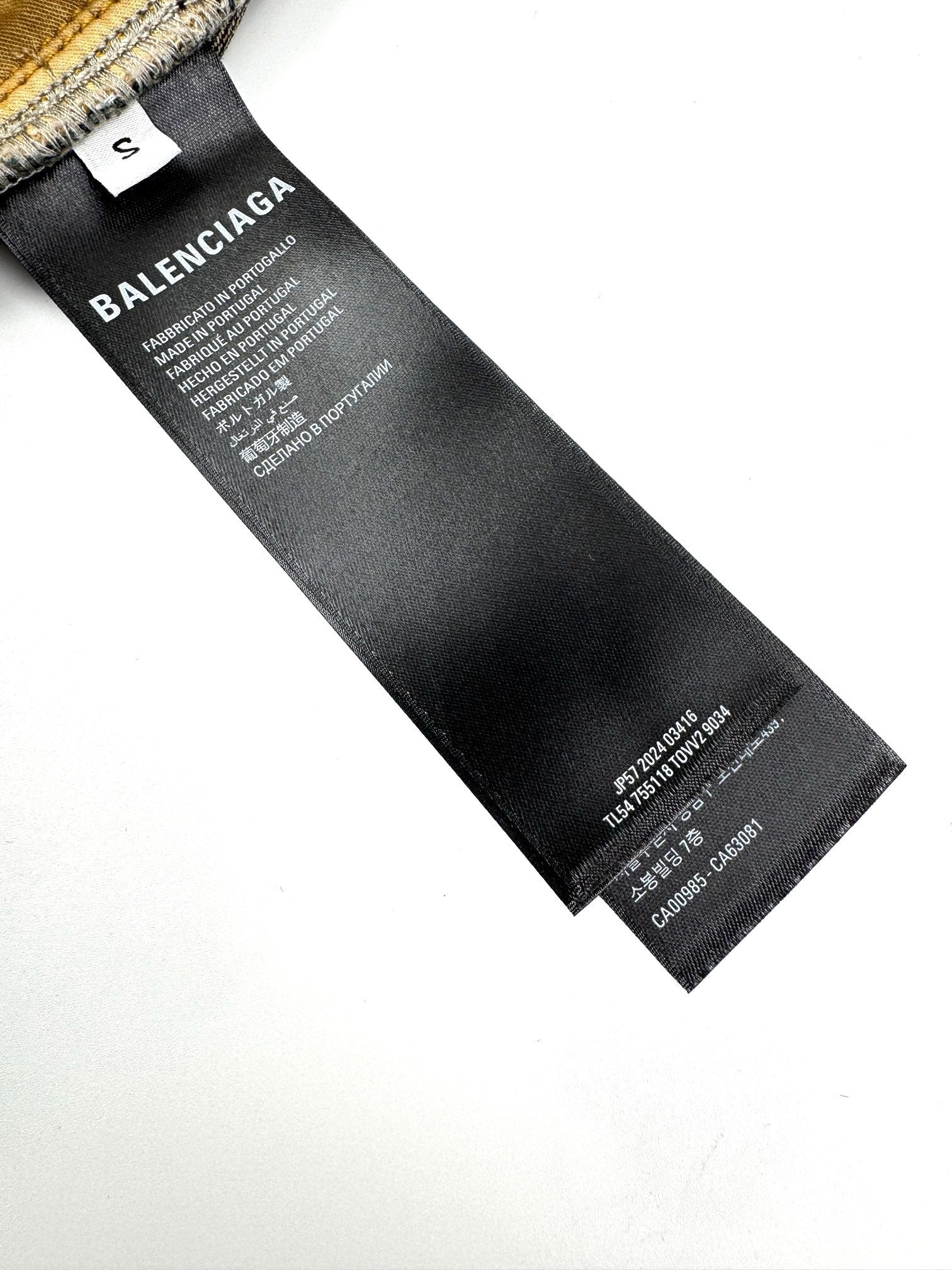 발렌시아가 로고 워싱 배기 데님 팬츠