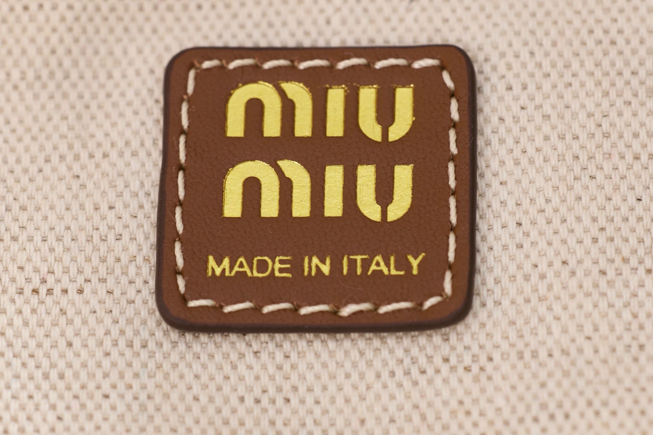 미우미우 캔버스 가죽 백팩 라지