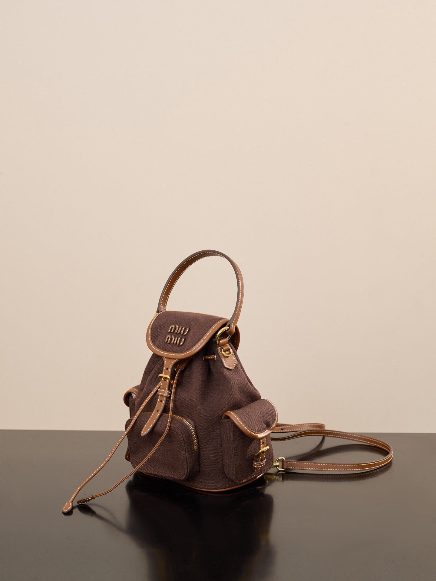 미우미우 캔버스 가죽 백팩 라지