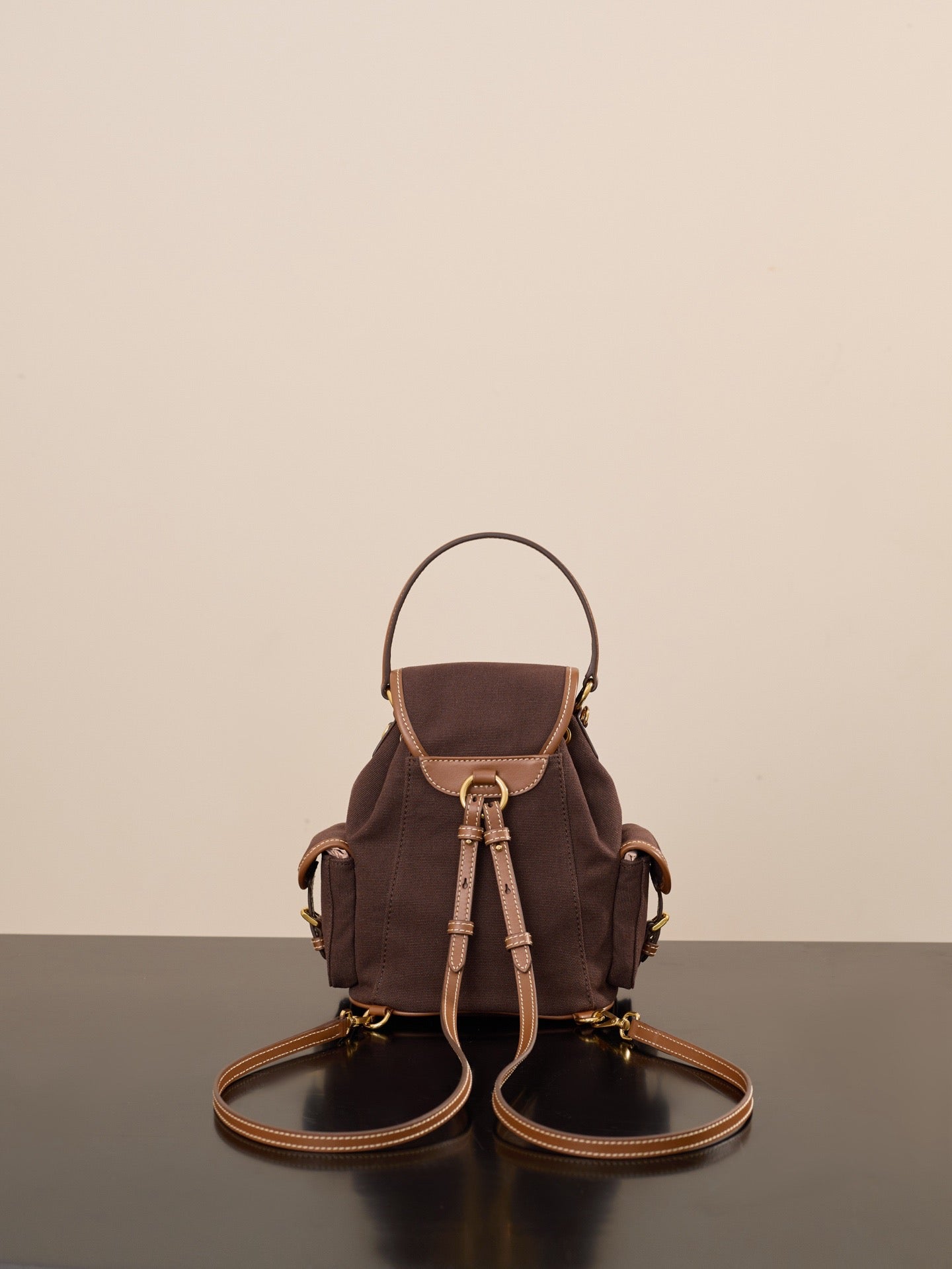 미우미우 캔버스 가죽 백팩 라지