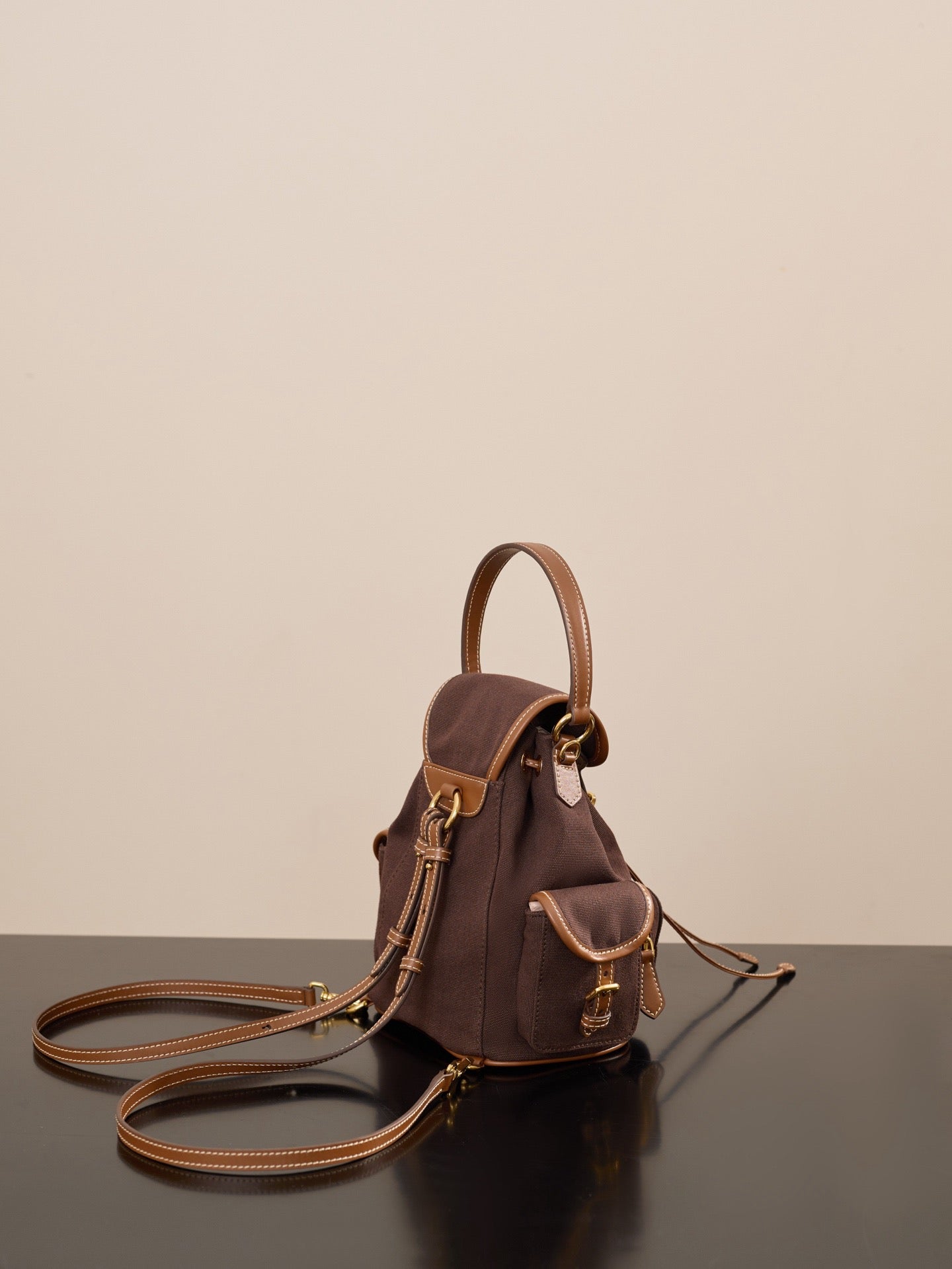 미우미우 캔버스 가죽 백팩 라지