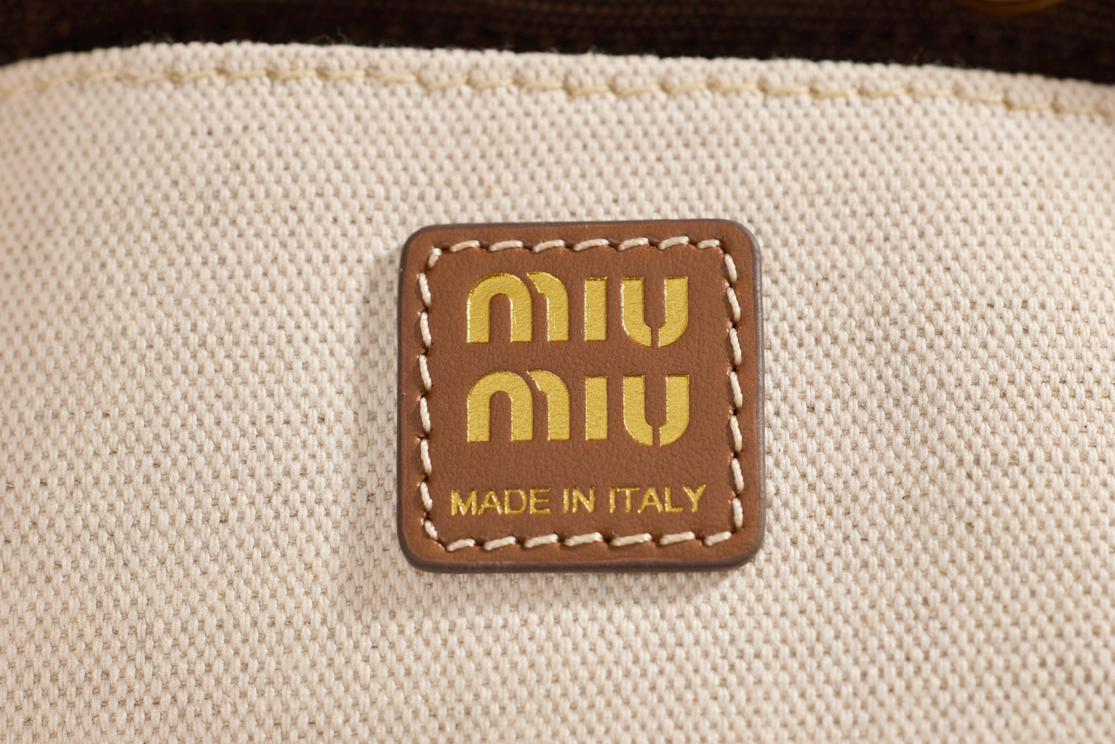 미우미우 캔버스 가죽 백팩 라지