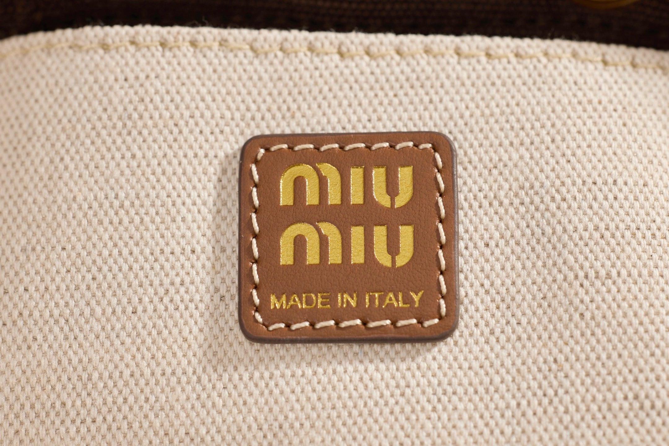 미우미우 캔버스 가죽 백팩 라지