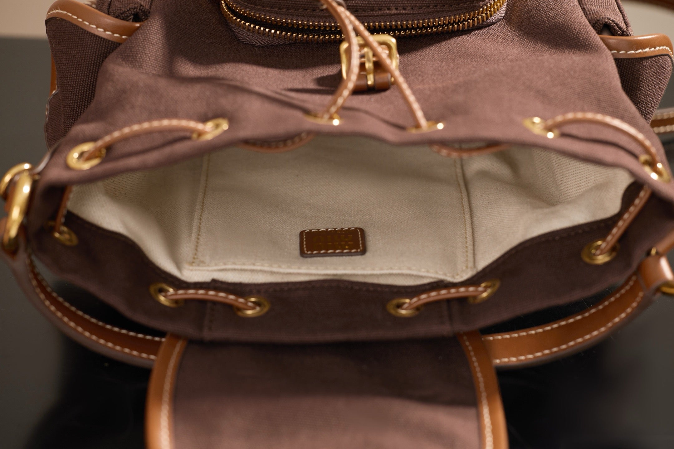 미우미우 캔버스 가죽 백팩 라지