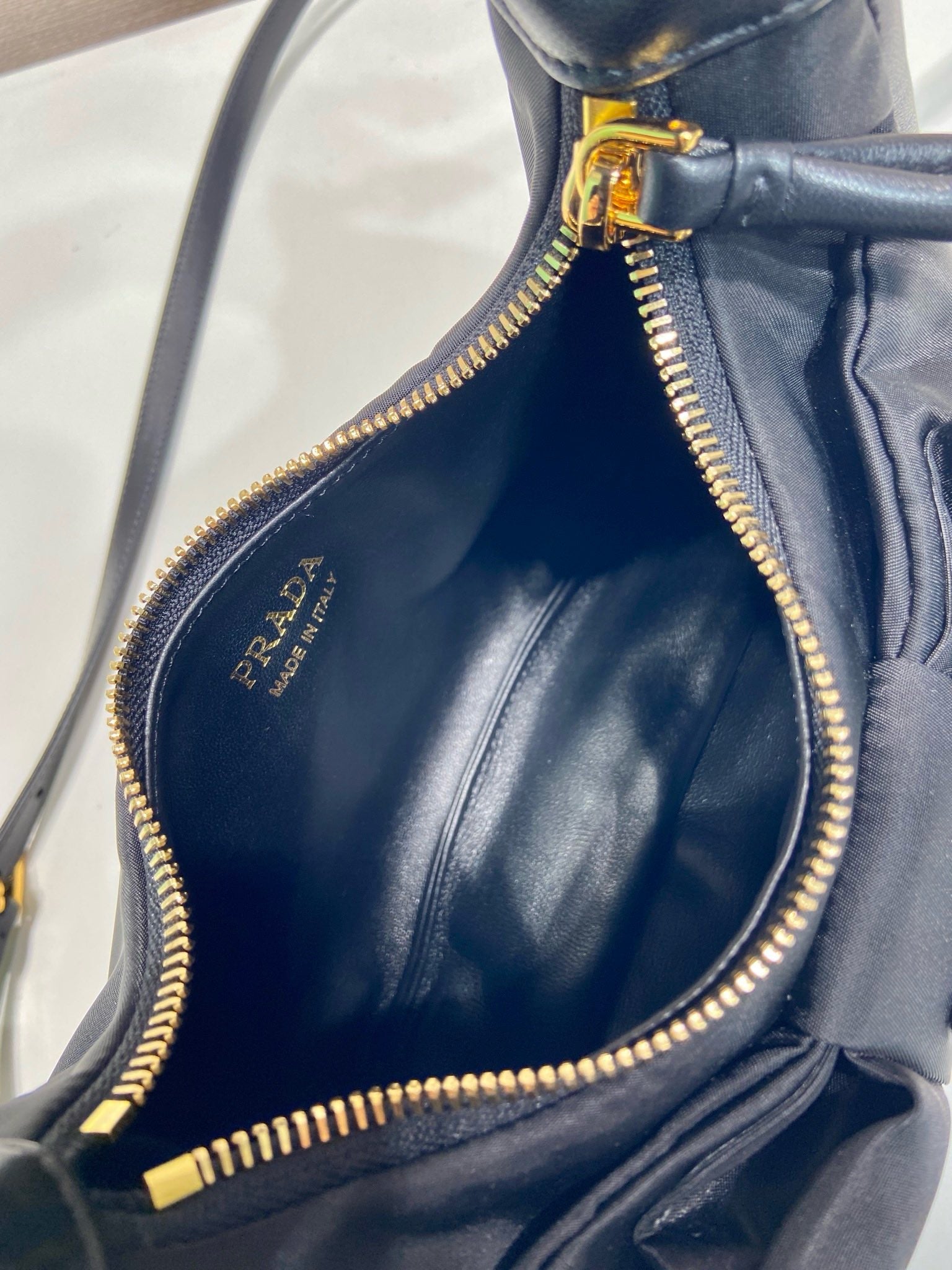 프라다 리본 장식 리나일론 및 나파 가죽 미니백