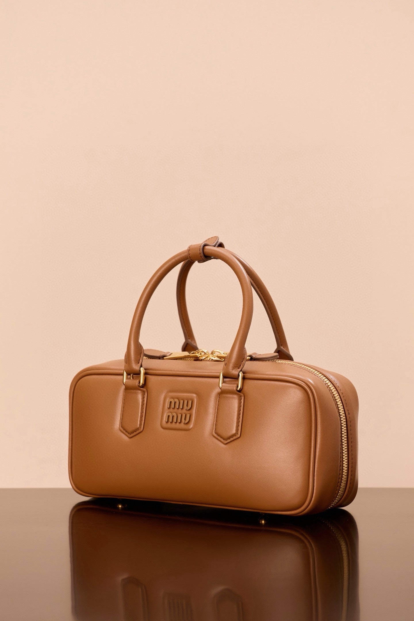 미우미우 아르카디 라지