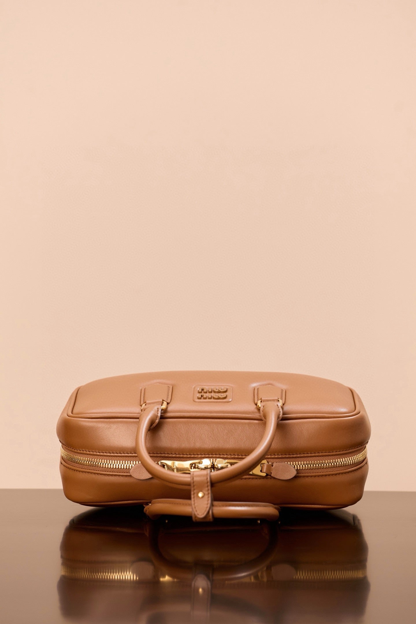 미우미우 아르카디 라지