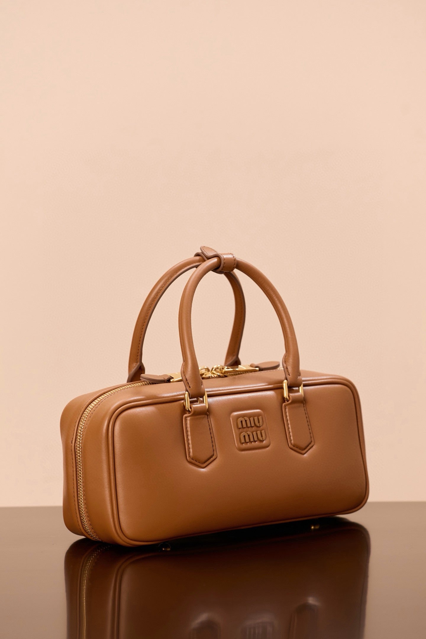 미우미우 아르카디 라지