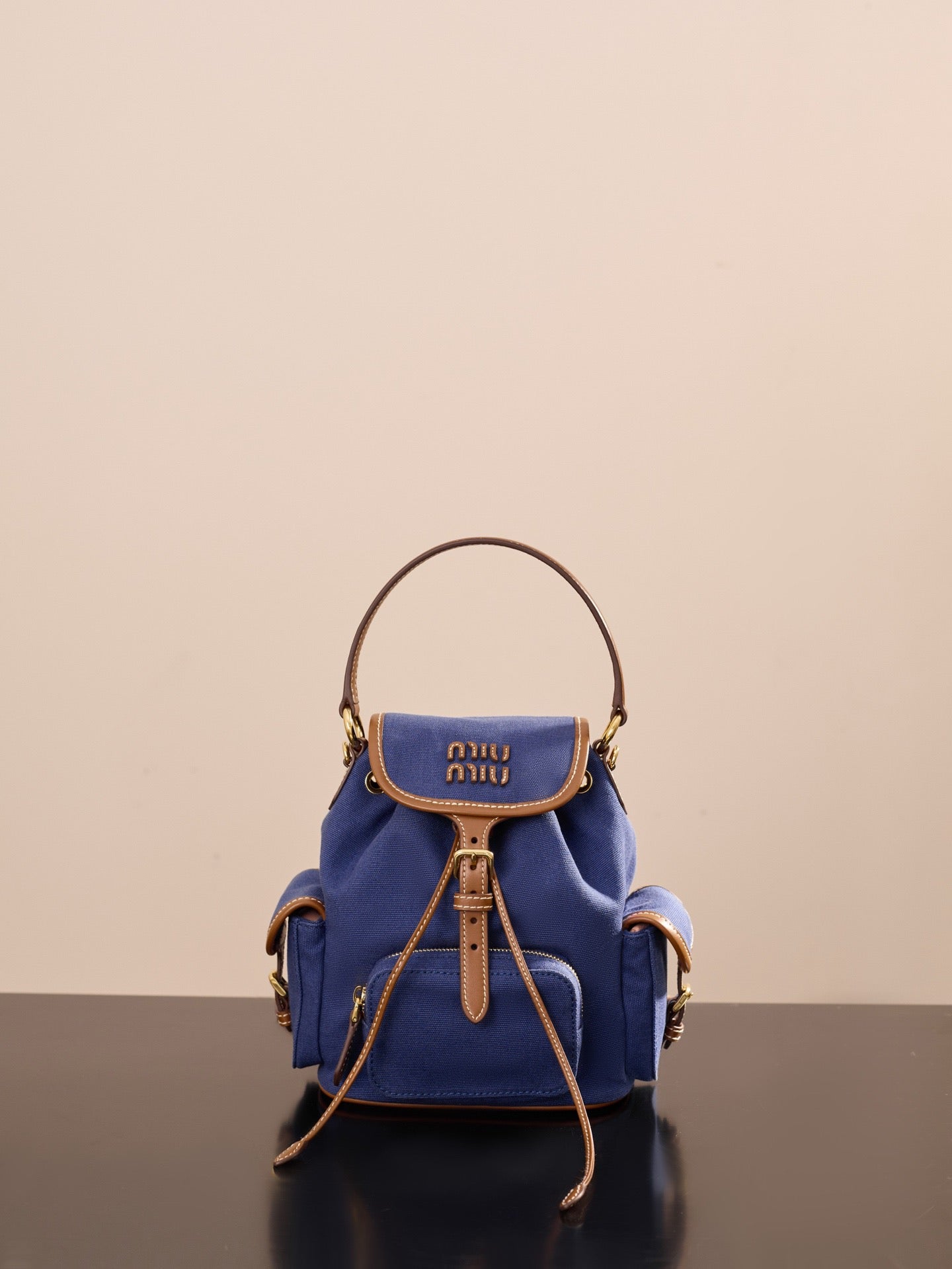 미우미우 캔버스 앤 레더 백팩 스몰