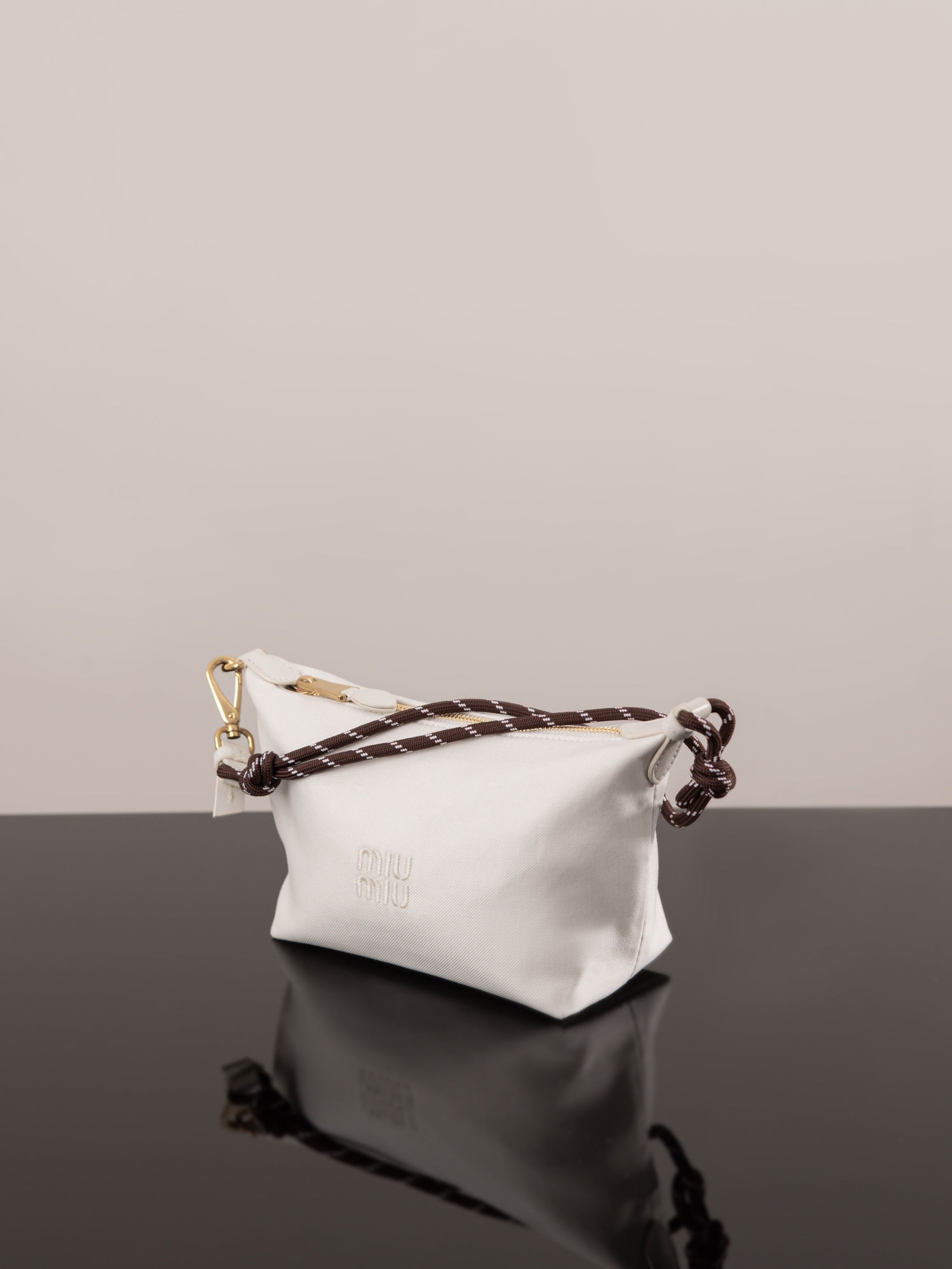 미우미우 개버딘 파우치