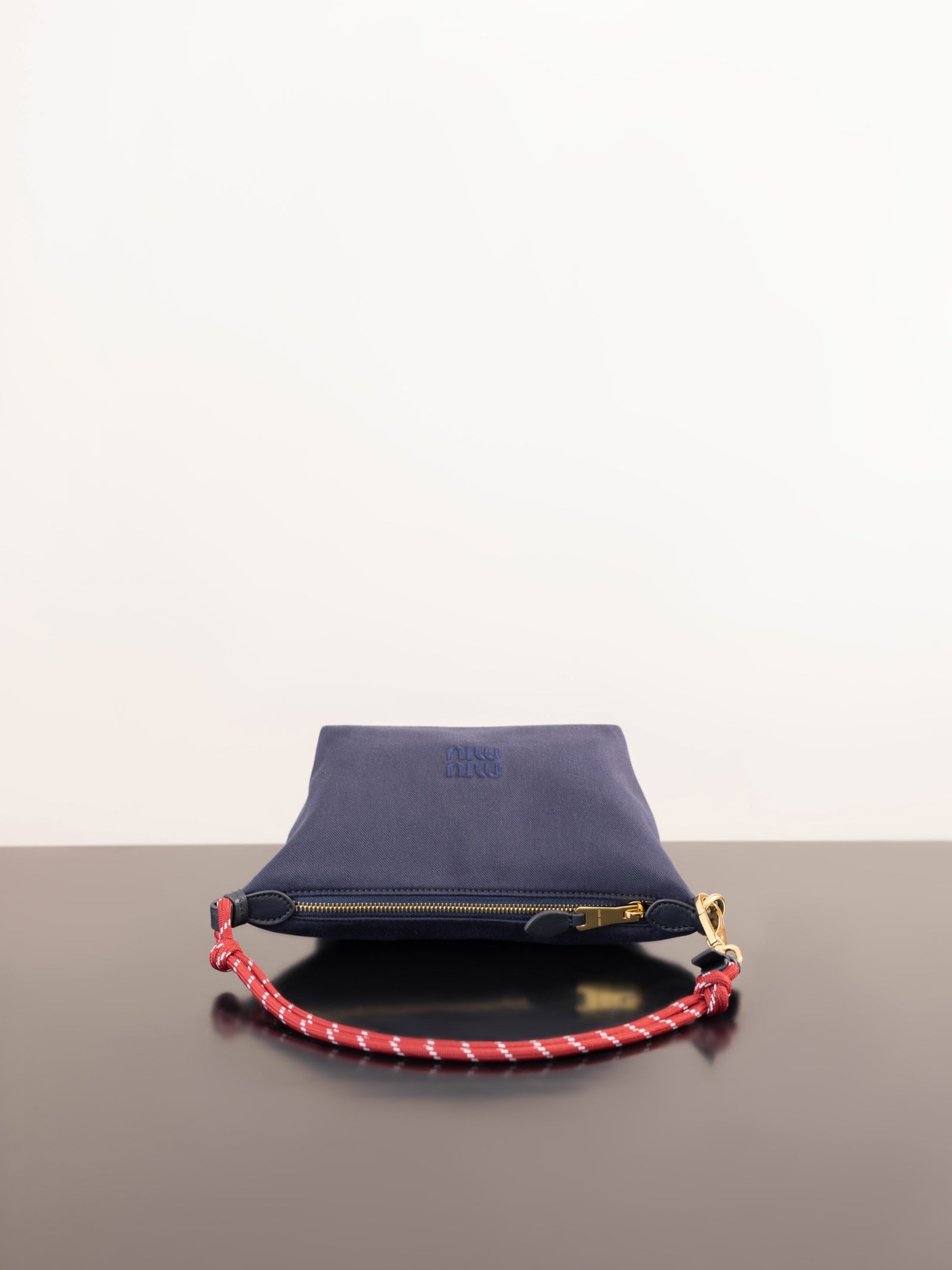 미우미우 개버딘 파우치