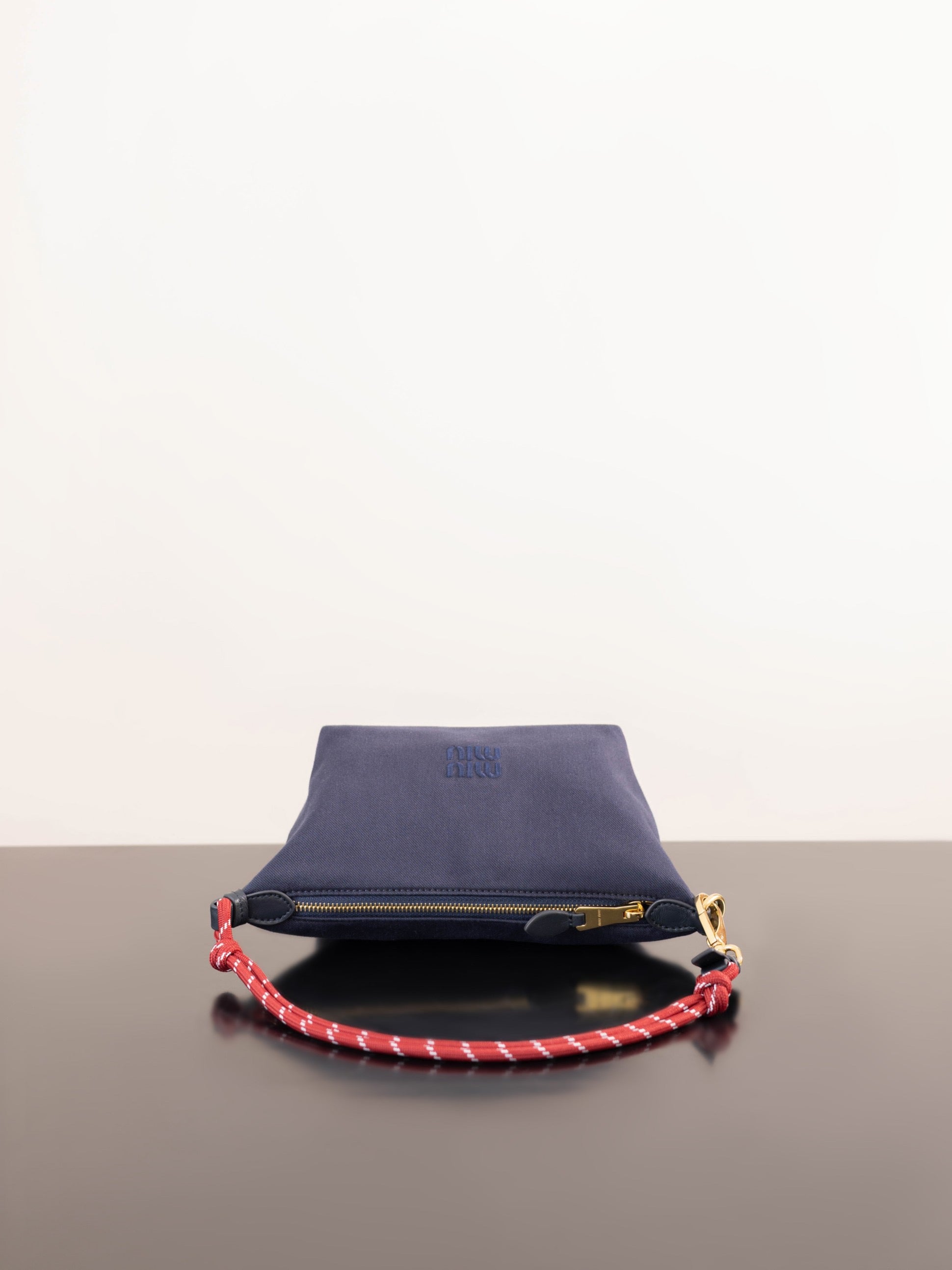 미우미우 개버딘 파우치