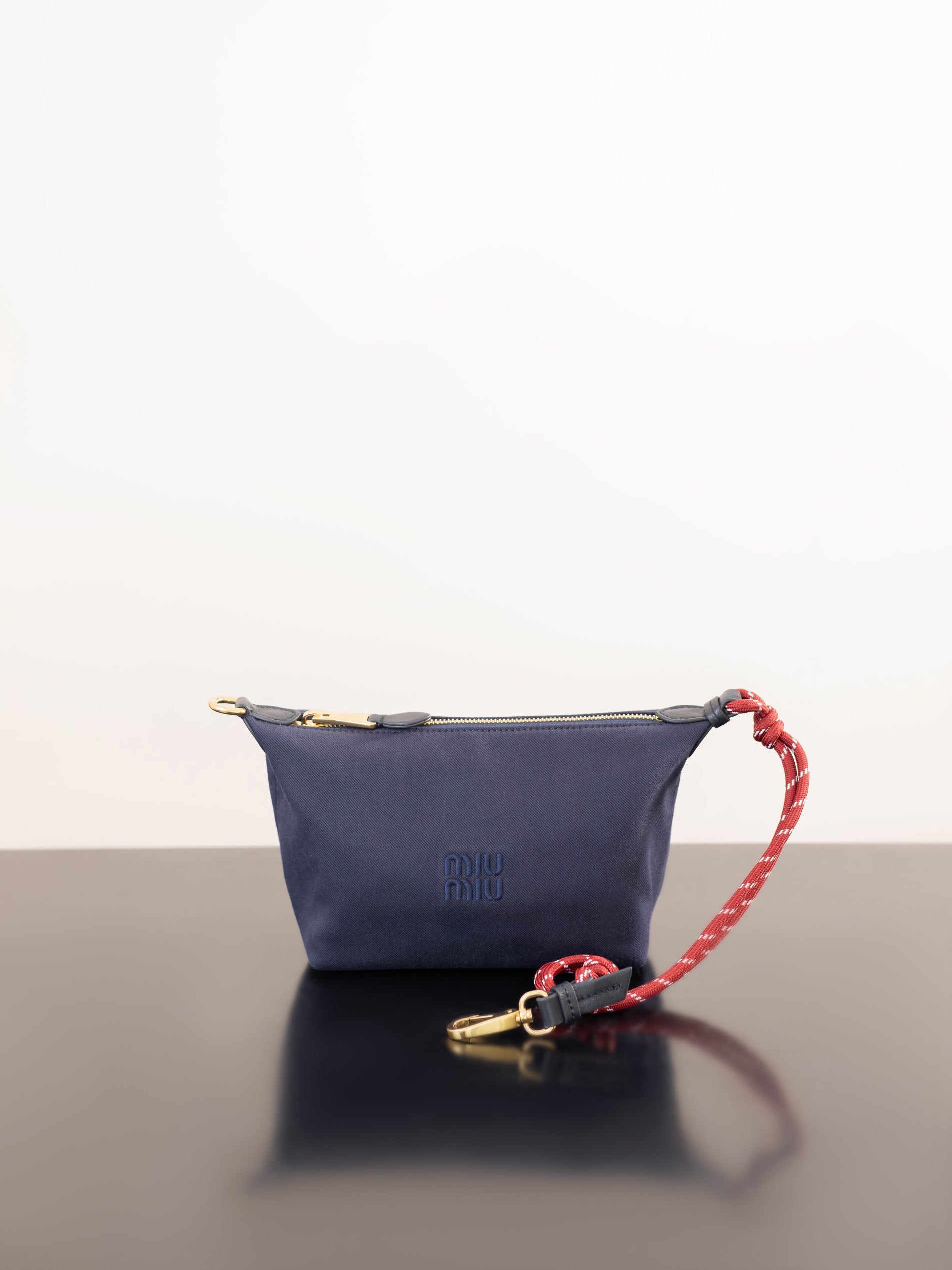 미우미우 개버딘 파우치