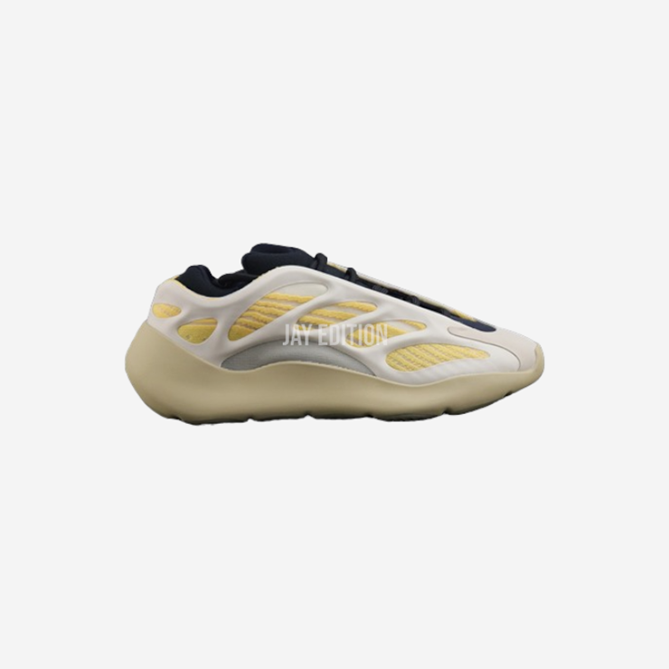 YEEZY 700 V3 새플라워, 소프트 퍼플 베이스와 네온 오렌지 스캐폴드가 조화를 이루는 매력적인 컬러웨이