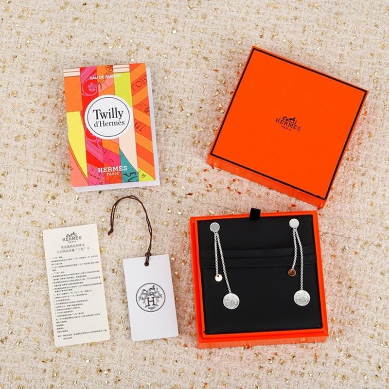 에르메스 Ex-Libris earrings